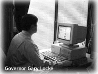 Gov. Locke at computer