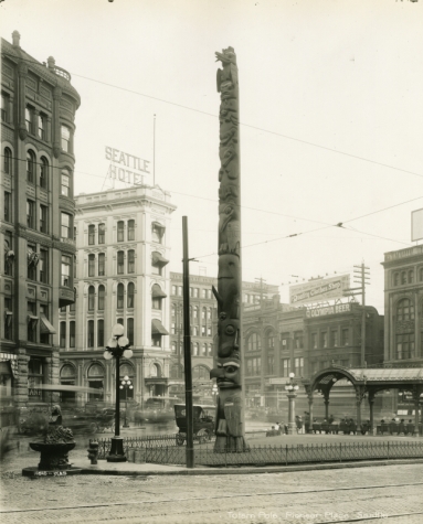 Totem pole, Pioneer Place, Seattle, Photographs, State Library Photograph Collection, 1851-1990 Washington State Archives, Digital Archives.