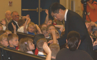 Gov. Locke and students at Michael Anderson Elementary School.