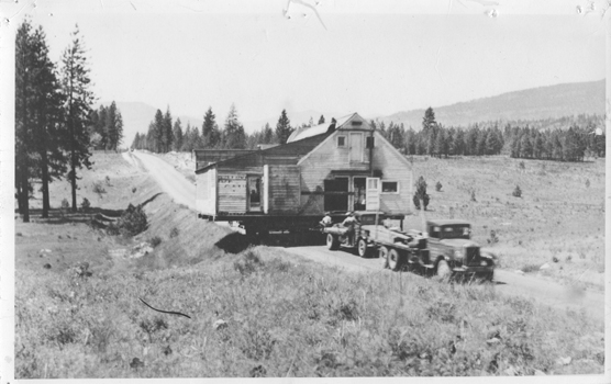 Truck Towing House on Trailer, 1900-1940, unknown photographer, scpa00800001032, Kettle Falls History Center Photographs, Crossroads on the Columbia Collection, Washington State Archives, Digital Archives.